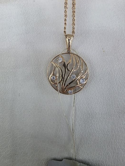 Продам золотые кулоны.