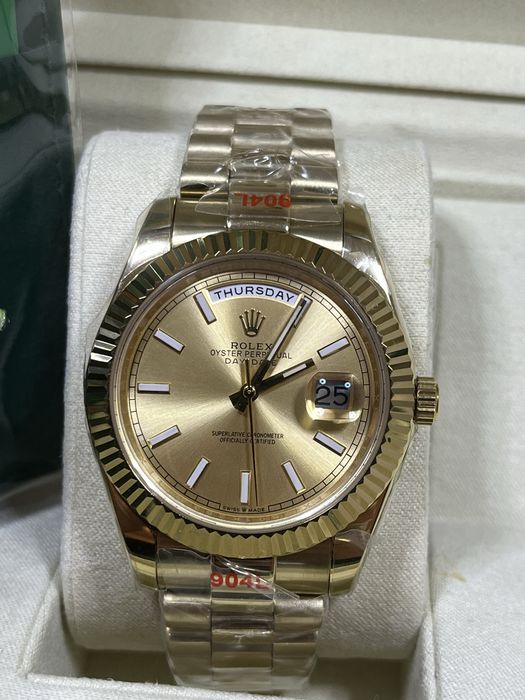 Rolex Day -Date Gold - model elegant