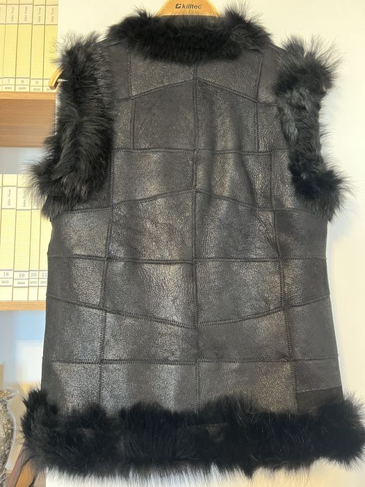 Vesta blana noua