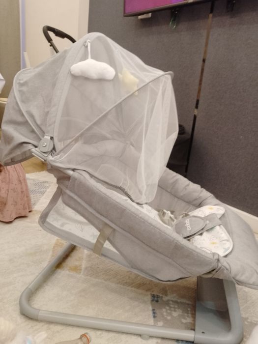 Детский шезлонг электрический.