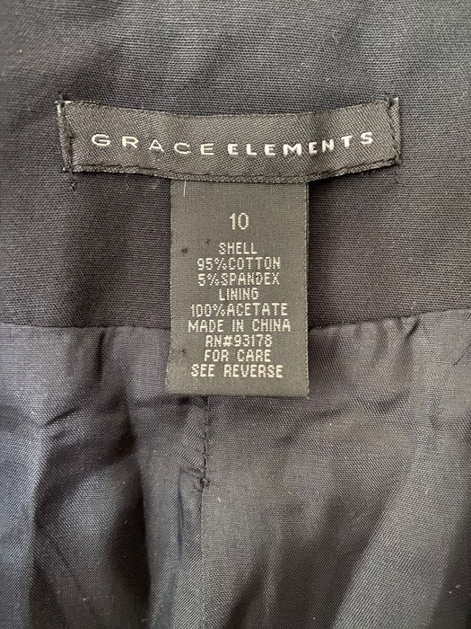 Елегантно черно сако с ципове на джобовете