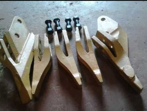 Коронки и адаптеры для ковшей экскаваторов