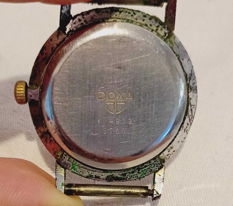 Ceas Doxa vechi, de colectie, mecanic, cu ceva patina a timpului. Necesita curatare