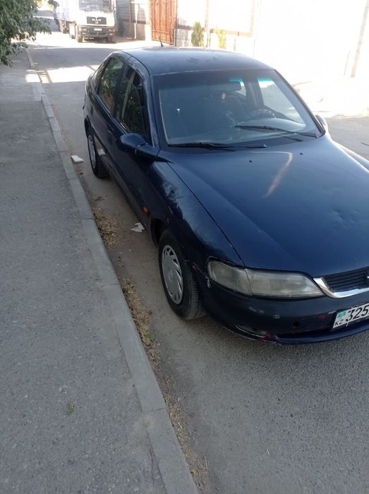 Машина Опел сатам