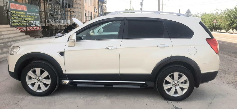 Каптива 1   2008 год белый жемчуг