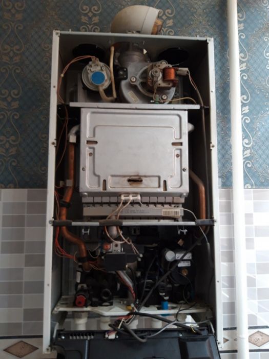 Santexnik Ремонт, очистка газовых двухконтурных котлов