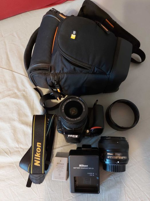 Фото апарат Nikon D5600-КАТО НОВ (само на 3267 кадъра!)+ два обектива + оригинално зарядно и оригинална батерия +стойка+фото чанта