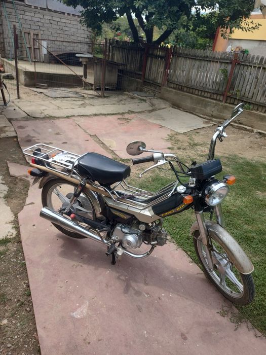 Scuter și motocicleta