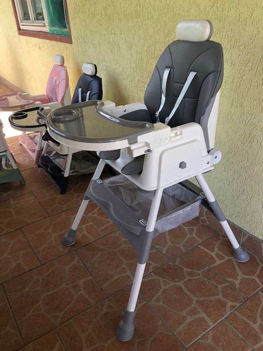 Scaun de masa bebe 4 in 1.Varsta 6-72 luni, Scaun inalt pliabil,4 roti silicon, 2 x Tava detasabila, Centura de siguranta in cinci puncte