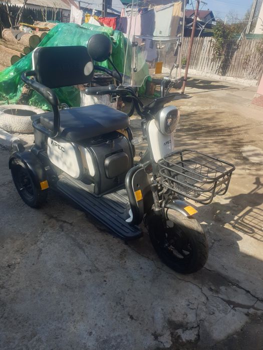 Triciclu electric.