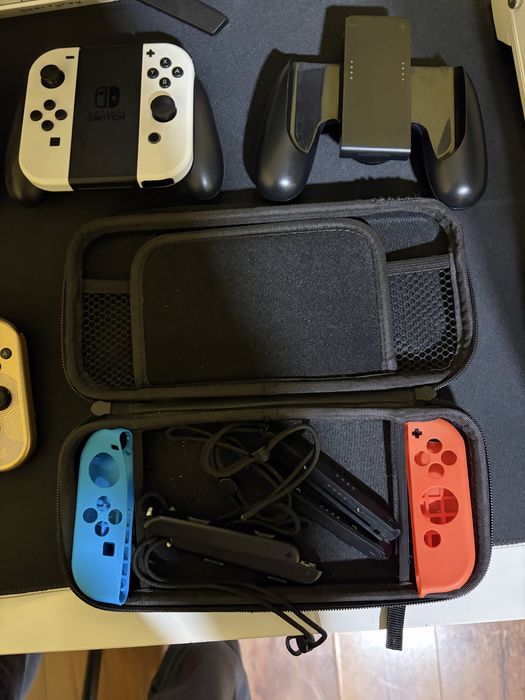Nintendo swich oled ca nou +3 jocuri Mario si un set joyconuri in plus