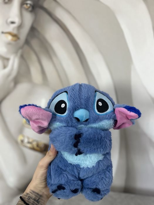 Jucarie interactiva Stitch care respira cu muzica si lumina