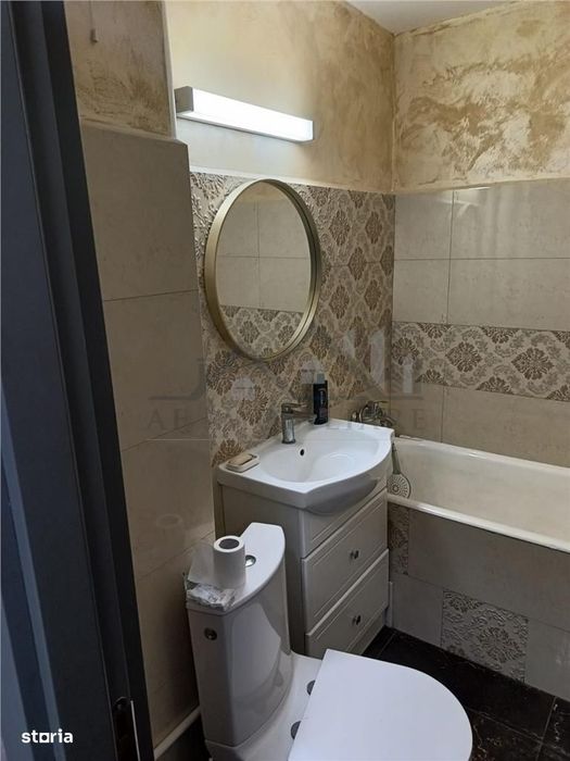Apartament 2 camere etajul 1 zona Podu Ros
