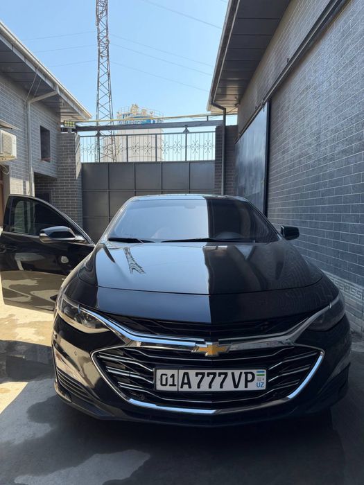 Malibu 2  rangi qora holati ideal 19-20 yili