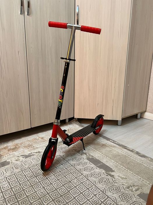 Новый самокат не использованный