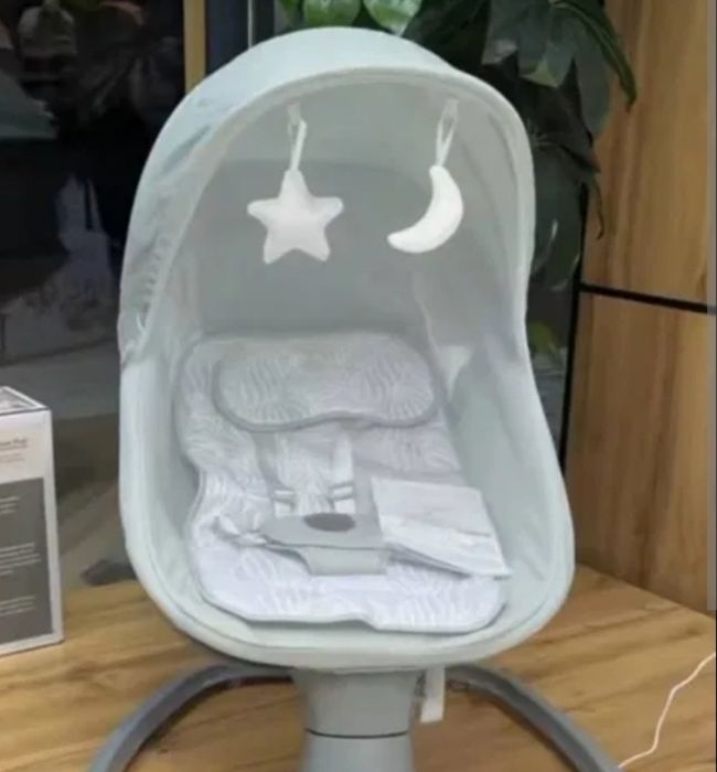 Kidelo belanchak bola xddi ona quchogʻida yotgandek yotadi .