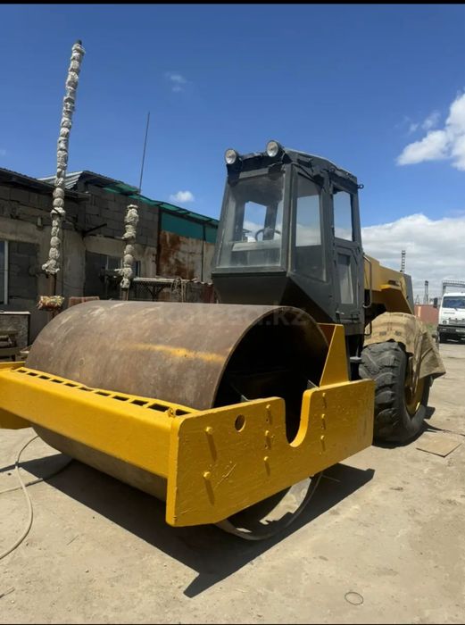 Грейдер, каток, тралл