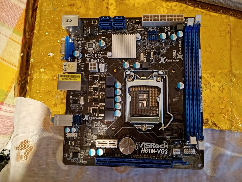 Vind placa de baza ASRock  H61M-VG3 perfecta functionala