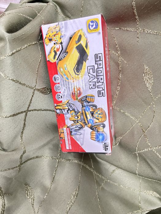 Игрушка трансформер музыкальный 1000 тенге