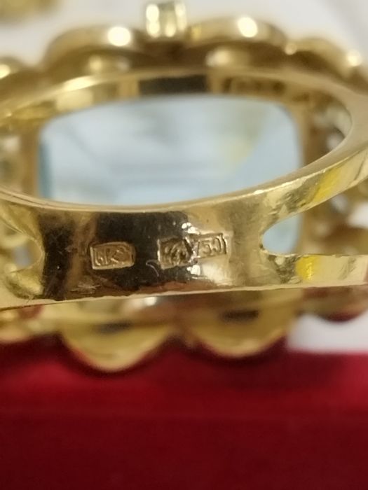 Продам комплект кольцо и серьги 750 проба.