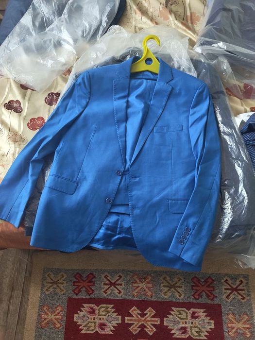 Мужские костюмы б/у