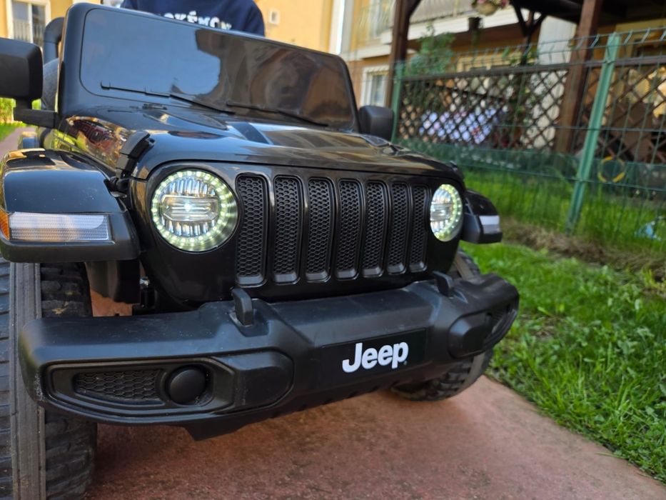 Masinuta electrica 4x4 Premier Jeep Wrangler Rubicon, 12V, roti cauciuc EVA, scaun piele