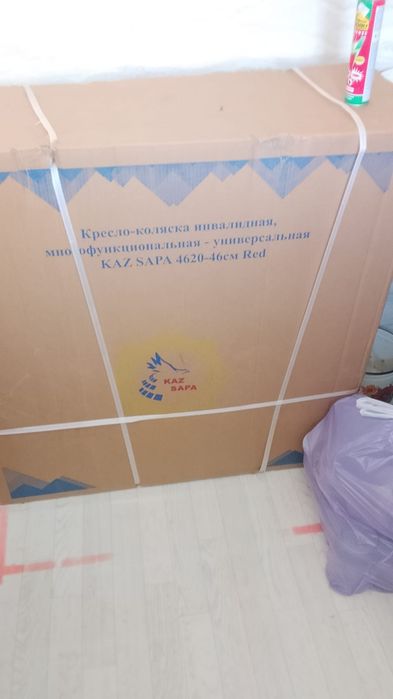 Инвалидная коляска и тренажер