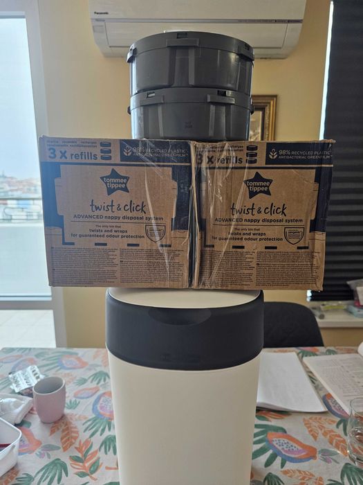 Адаптирано мляко и кош за памперси