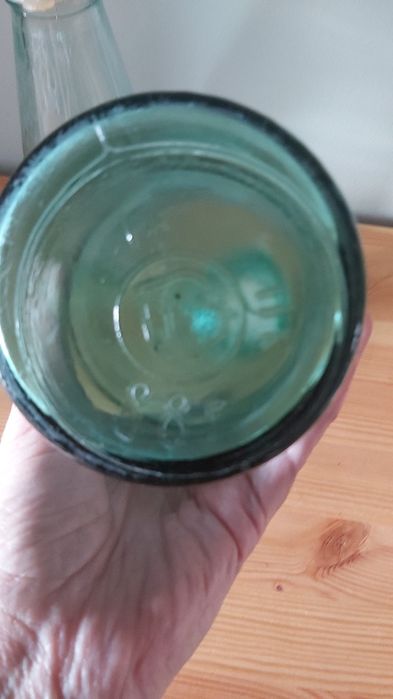 Бутылки молочные