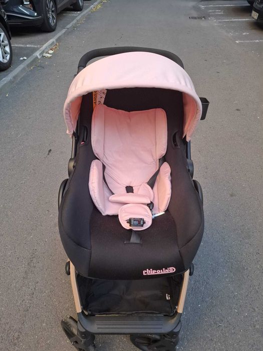 Cărucior roz cu landou si scoica