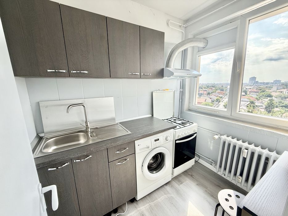 Garsoniera berceni grand arena proprietar