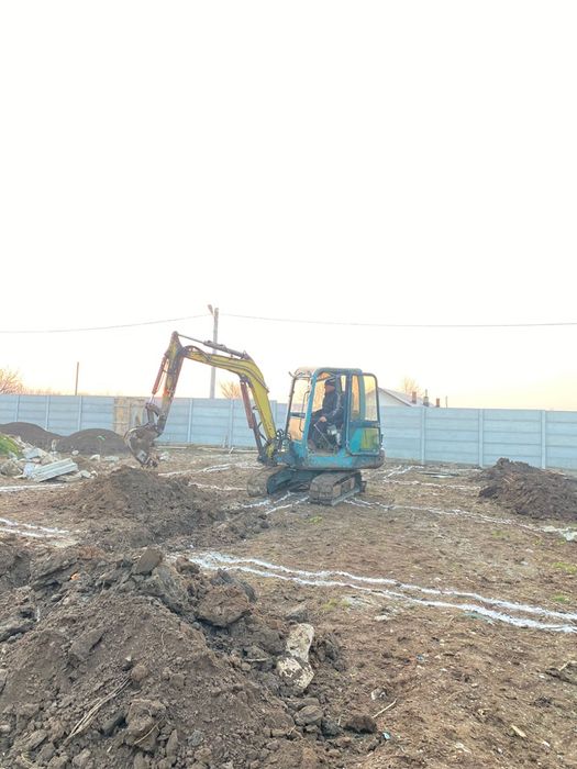 Lucrari cu buldo cu picon miniexcavator bobcat