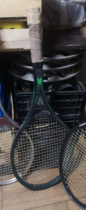 Теннисный ракетки