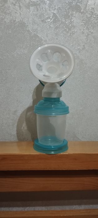 Молокоотсос механический