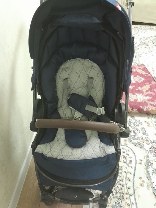 Коляска новая, синий цвет