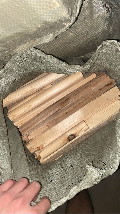 Сухие дрова в мешках