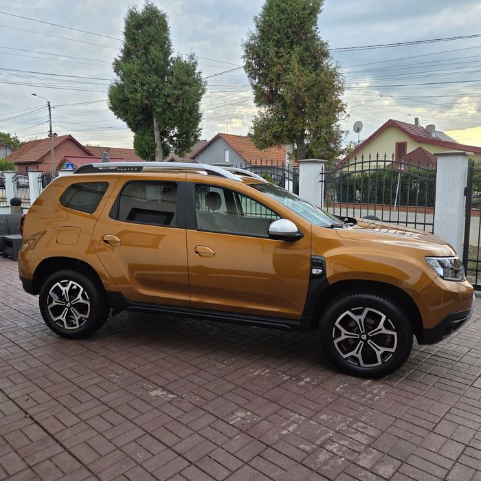 Dacia Duster 4x4 1.2 benzina 125CP Turbo~Impecabil~Prestige Orange~jante/Navi/Camera/carte service