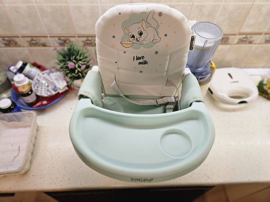 Înălțător scaun de masa Chipolino Lollipop avocado