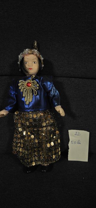 Păpuși cu cap din portelan