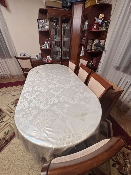 Шкаф и столы со стульями