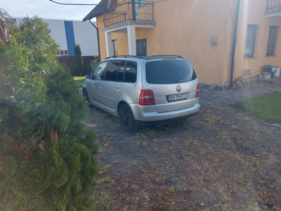 Vand vw touran 1.6 benzina automata