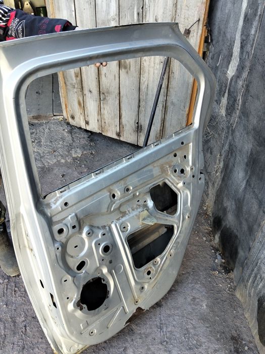 Дверь Рено Логан 2