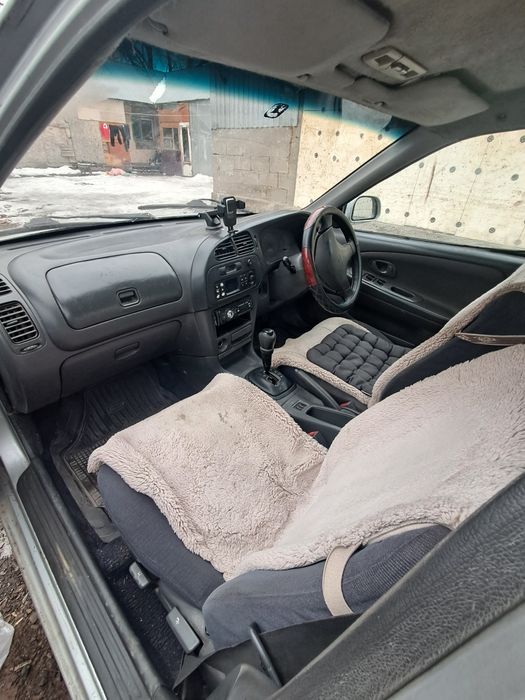 Машина митсубиши мираж