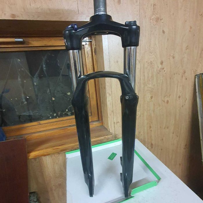 Велосипед впередный вилка амортизатор.