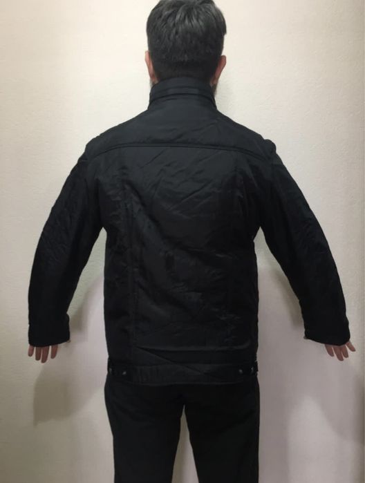 Продам осенью куртку