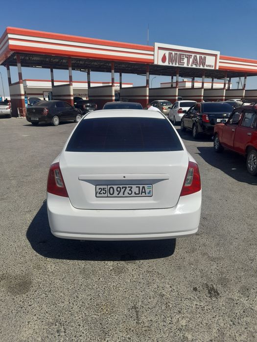 Gentra 2016 oq rangdagi mexanik korobka