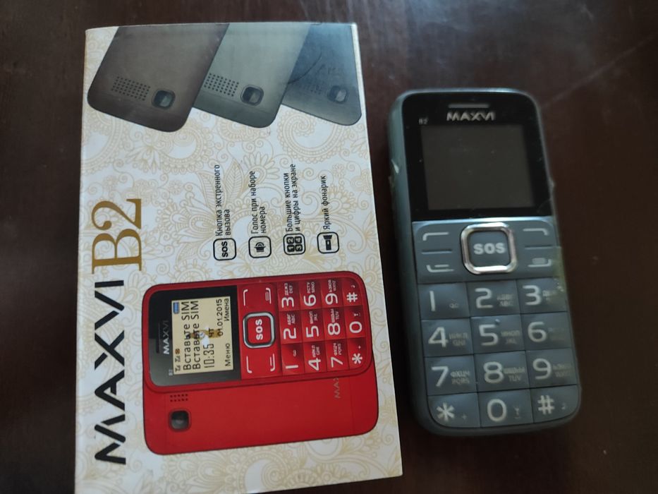 Кнопочный сотовый телефон . Рабочий.