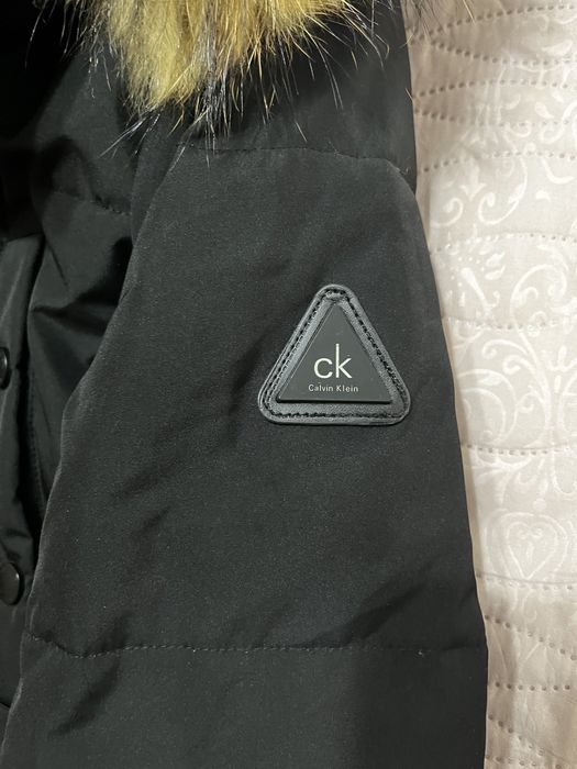 Продам зимний пуховик