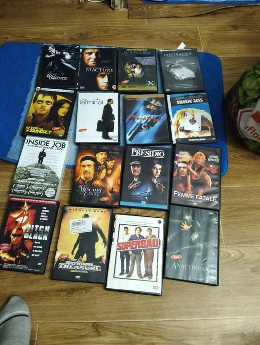 Vând 60 dvd uri filme