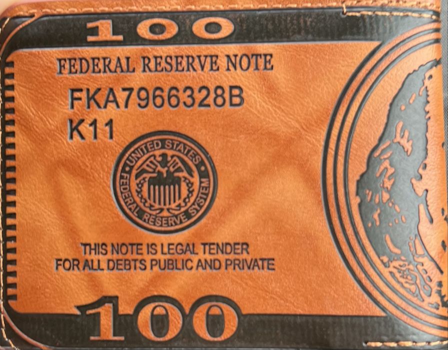 Кошелек оранжевый с черным оформлением 100$ купюры